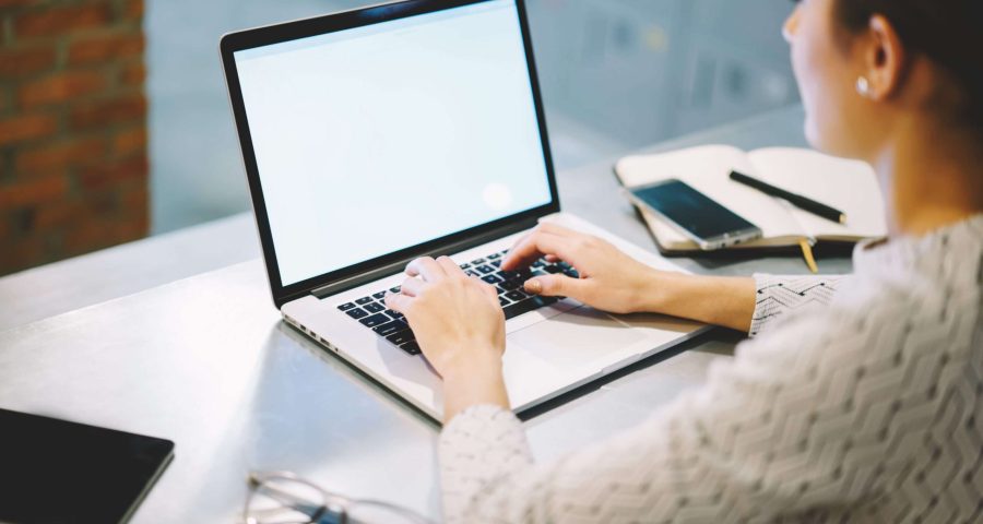 woman making web page on computer