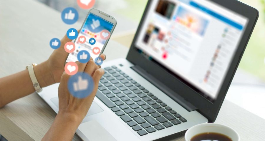 engagement and notifications popping up on woman's phone and laptop