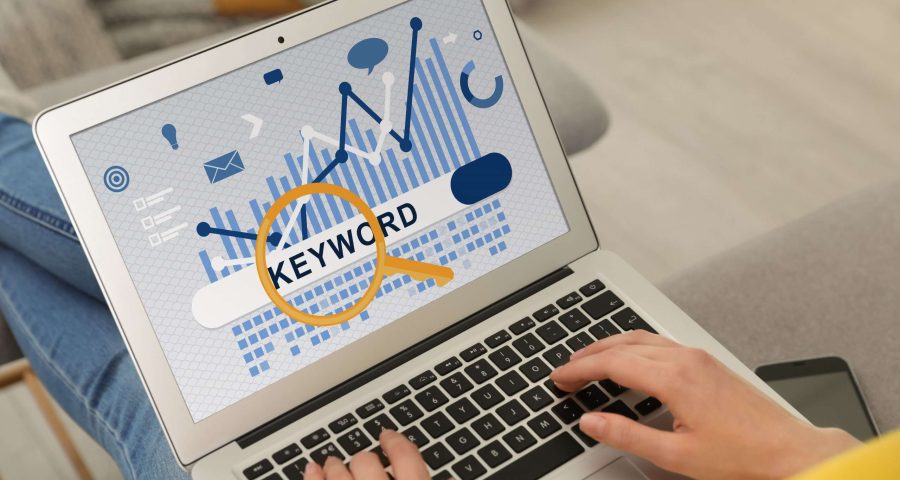 laptop screen with keywords on it