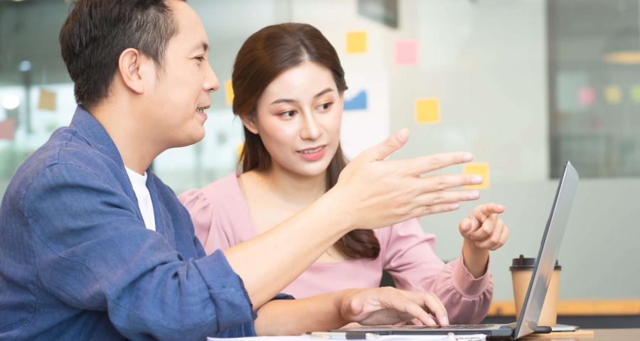 business owners doing an SEO competitor analysis