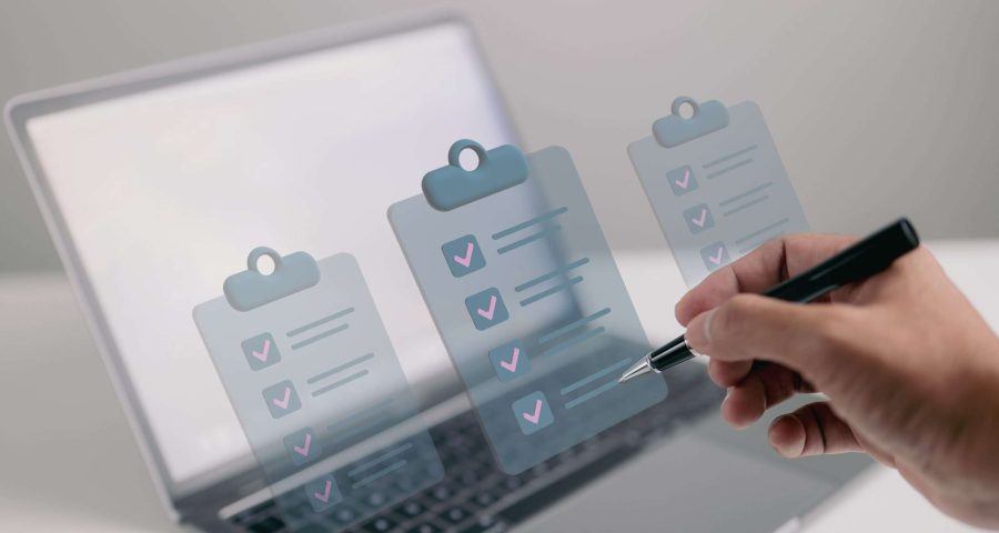 clipboard checklist in front of computer