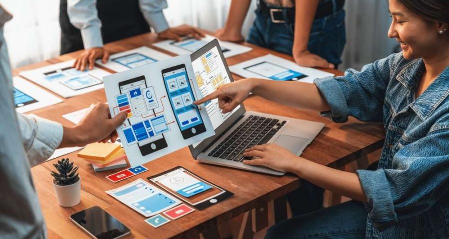 woman planning her digital content strategy on her laptop