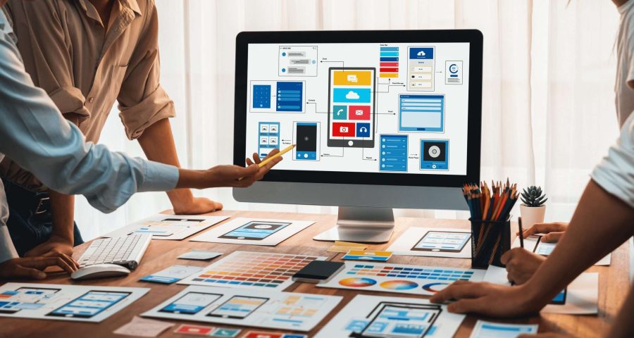 team working on designing on a desktop