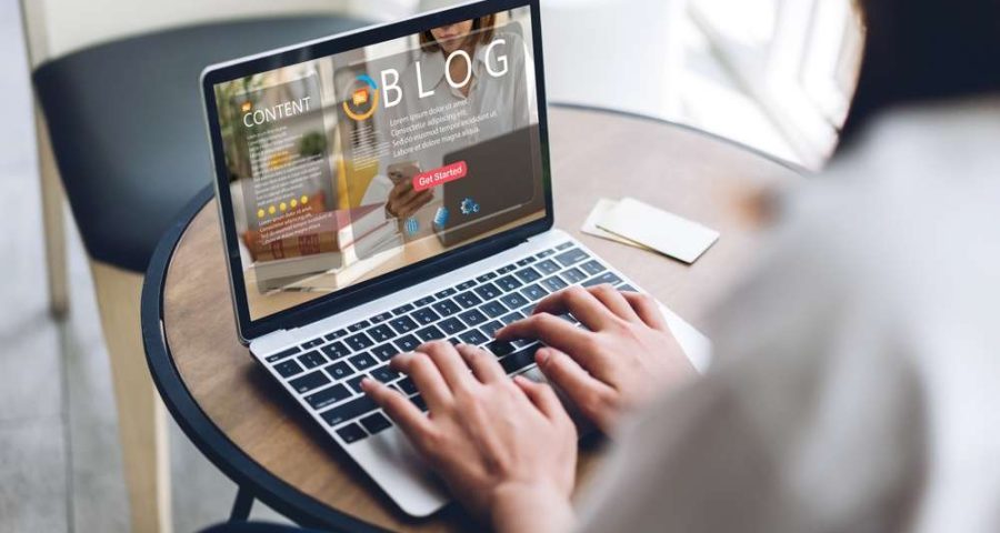 blogging on a laptop