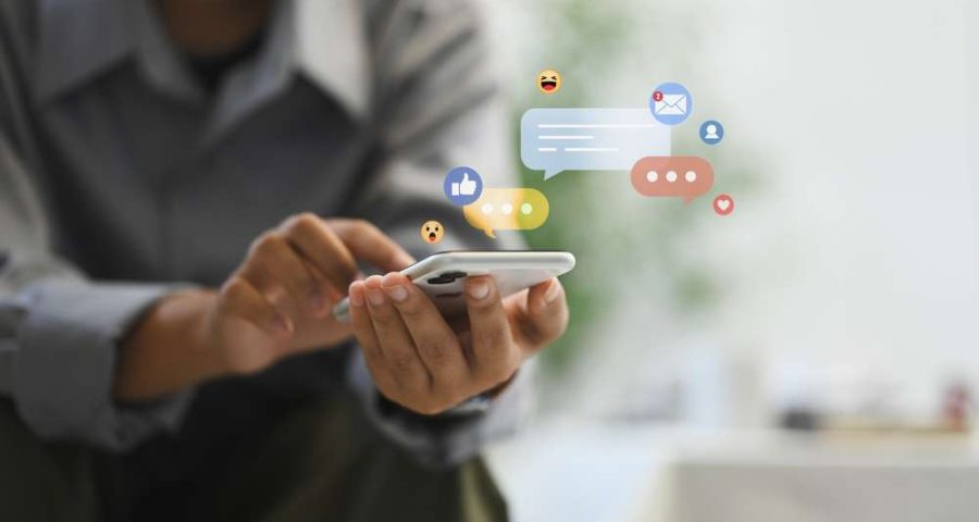 a woman using social media on her smartphone