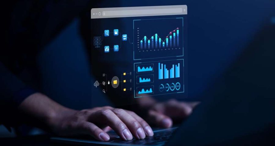 Someone looking at analytics on a laptop