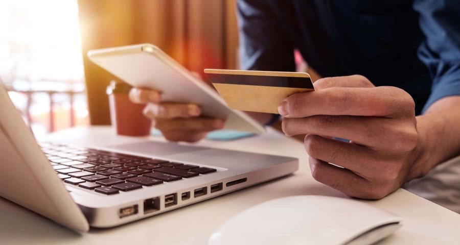 man holding credit card ecommerce