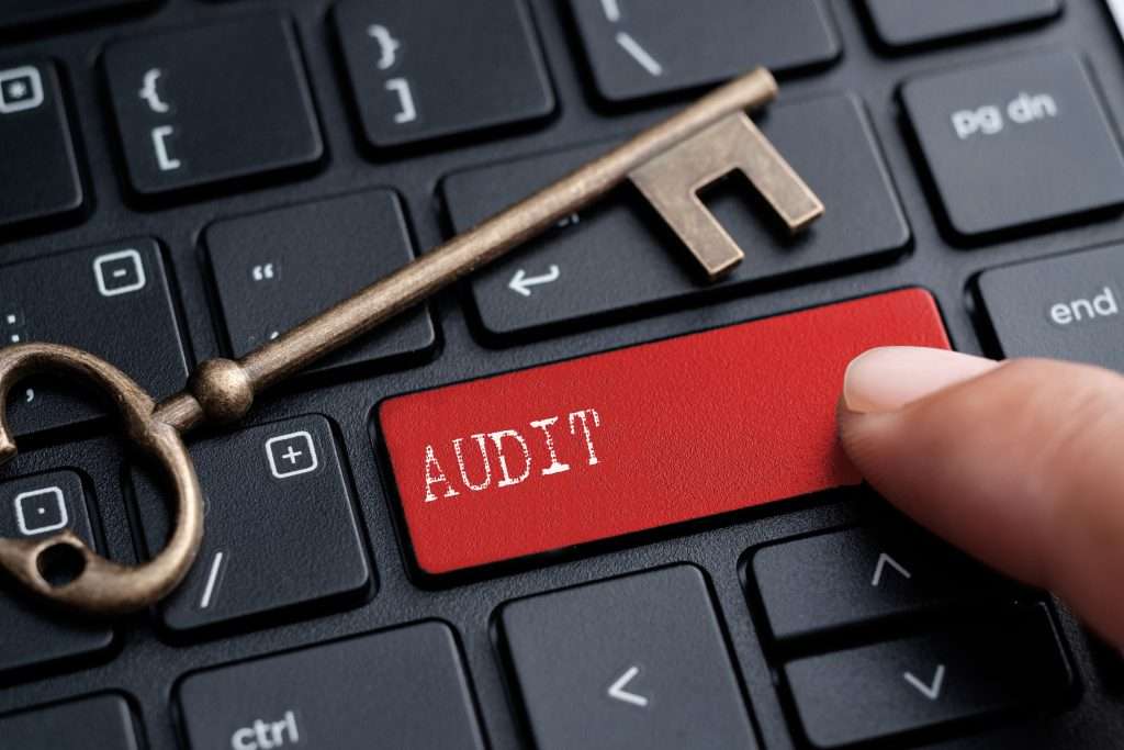 Content Audit, keyboard with key and Audit